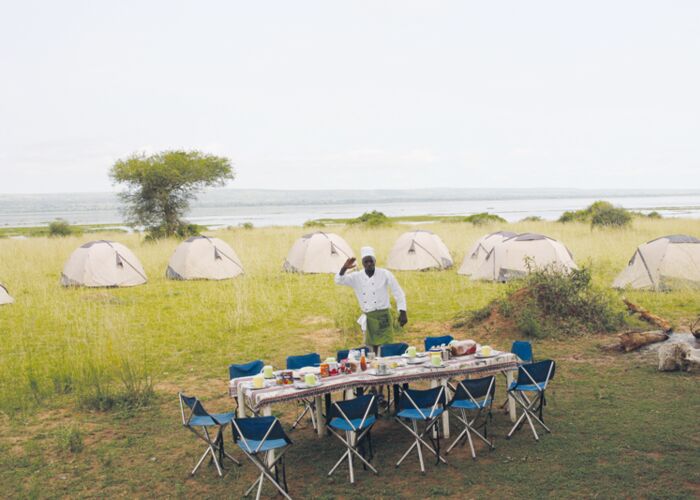 Unser Safari Guide ruft zum Mittagessen auf Safari im Murchison Falls Nationalpark